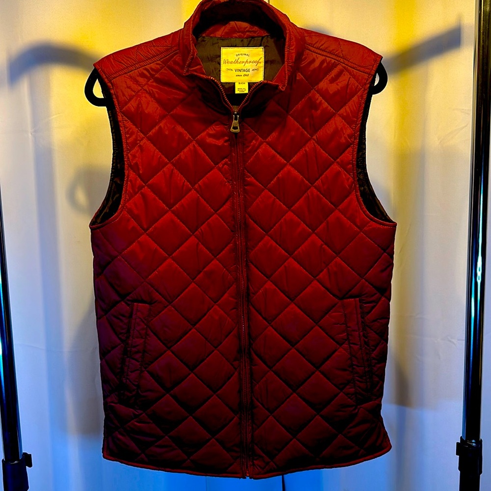 Men’s small maroon vests with a black inner lining